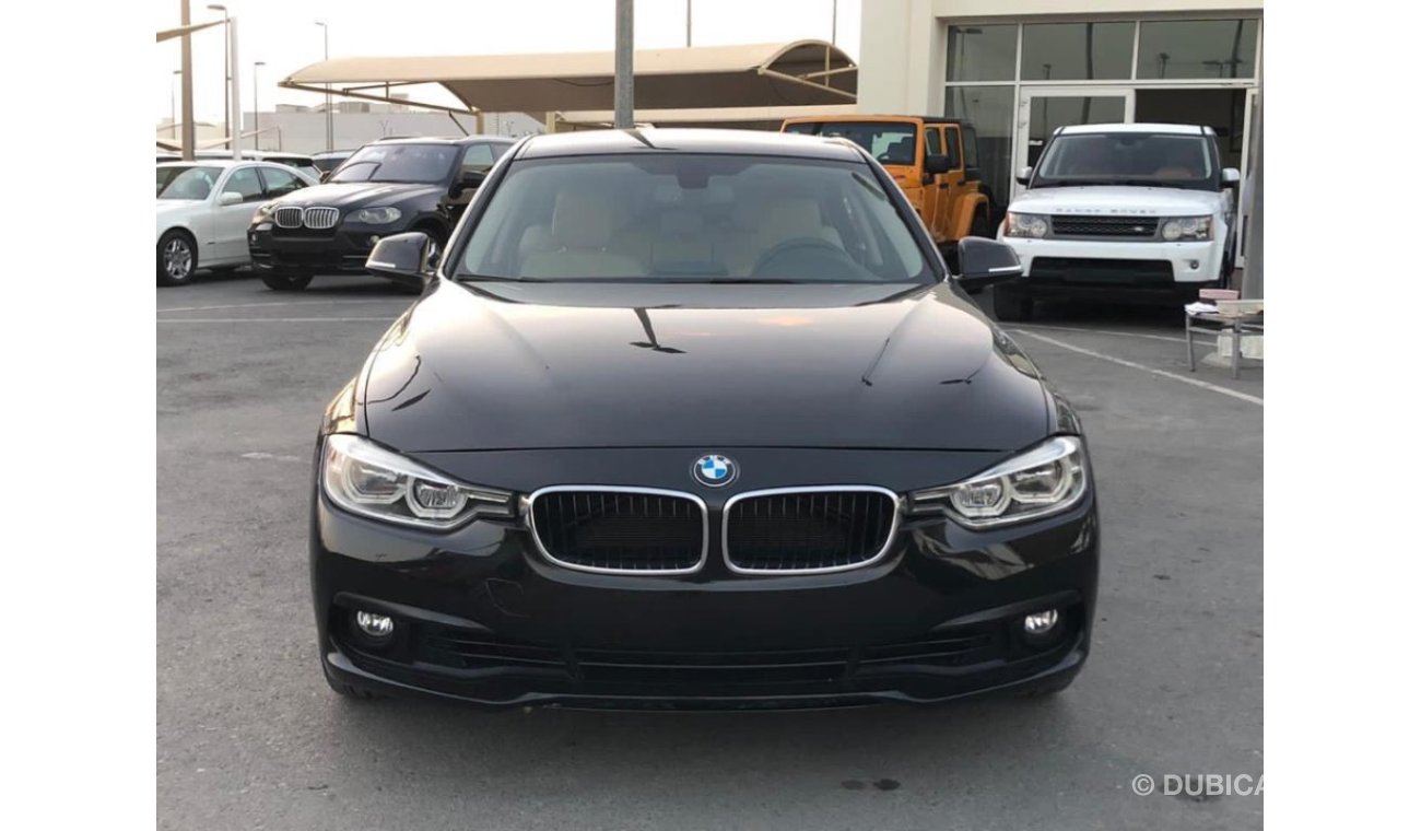 BMW 320i BMW 320 MODEL 2018 GCC car prefect condition leather seats back camera