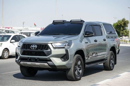 تويوتا هيلوكس A Hilux canopy is a protective shell with a roof, walls, and windows that fits over the tray of a To