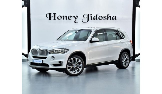 BMW X5 EXCELLENT DEAL for our BMW X5 xDriver50i ( 2014 Model ) in White Color GCC Specs