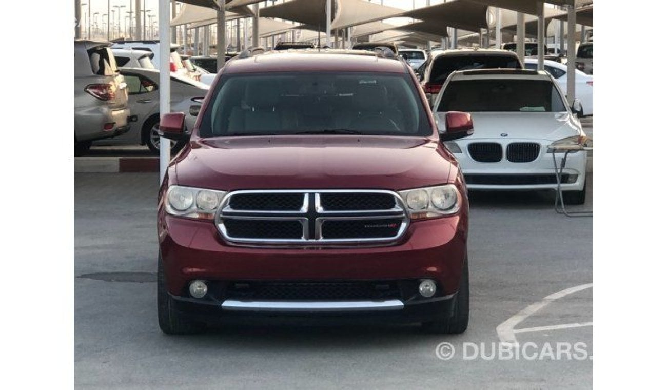 Dodge Durango Model 2013 GCC, full specifications, leather seats, cruise control, full electric control, and an ex