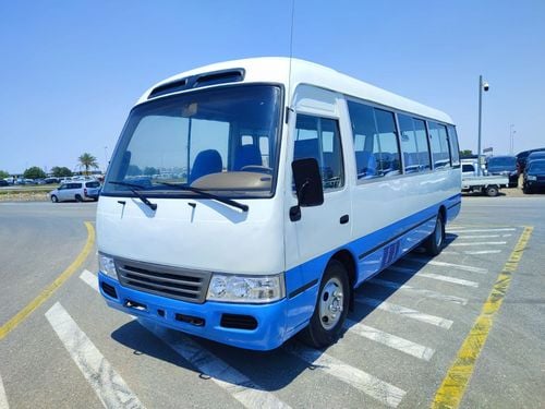 Toyota Coaster JTB43PB51W6000527 || TOYOTA COASTER (BUS)	2009	WHITE/BLUE	 MANUAL || LEFT HAND DRIVE.