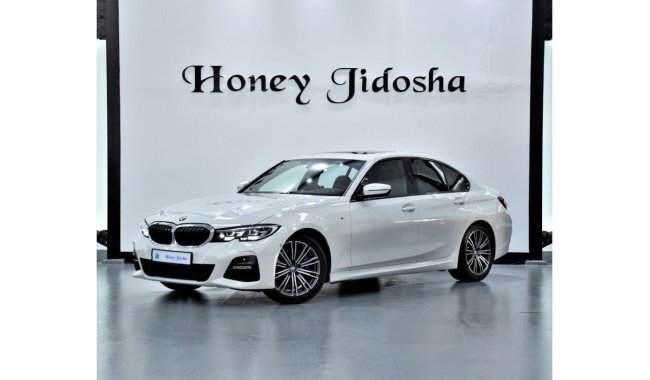 BMW 330 EXCELLENT DEAL for our BMW 330i M-Kit ( 2019 Model ) in White Color GCC Specs