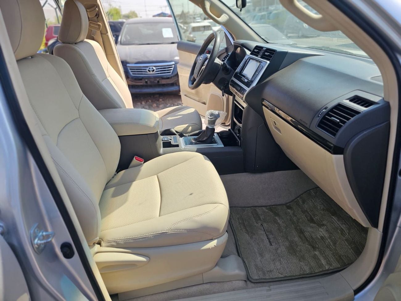 Toyota Prado TX-L 2022MODEL 2.7 v4 petrol Engine Colour sliver Transmission Automatic Interior Beige Leather seats 7se