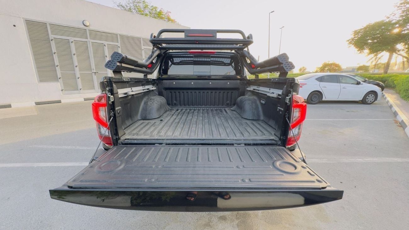 نيسان نافارا Double Cab | 2.3L Diesel Auto | RHD | Premium Roof Rack & Camping Setup | 2WD