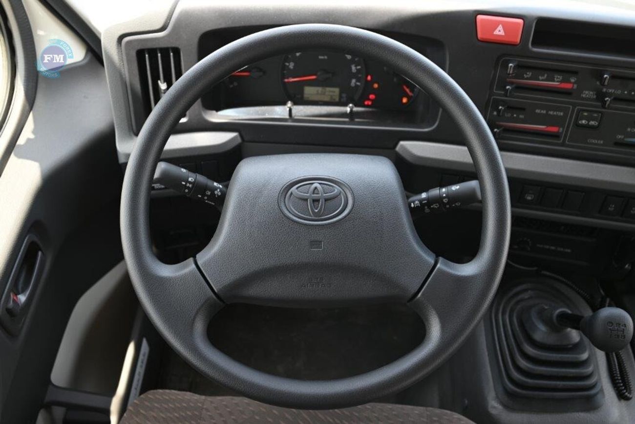 Toyota Coaster 4.0L Diesel High Roof 22 Seater