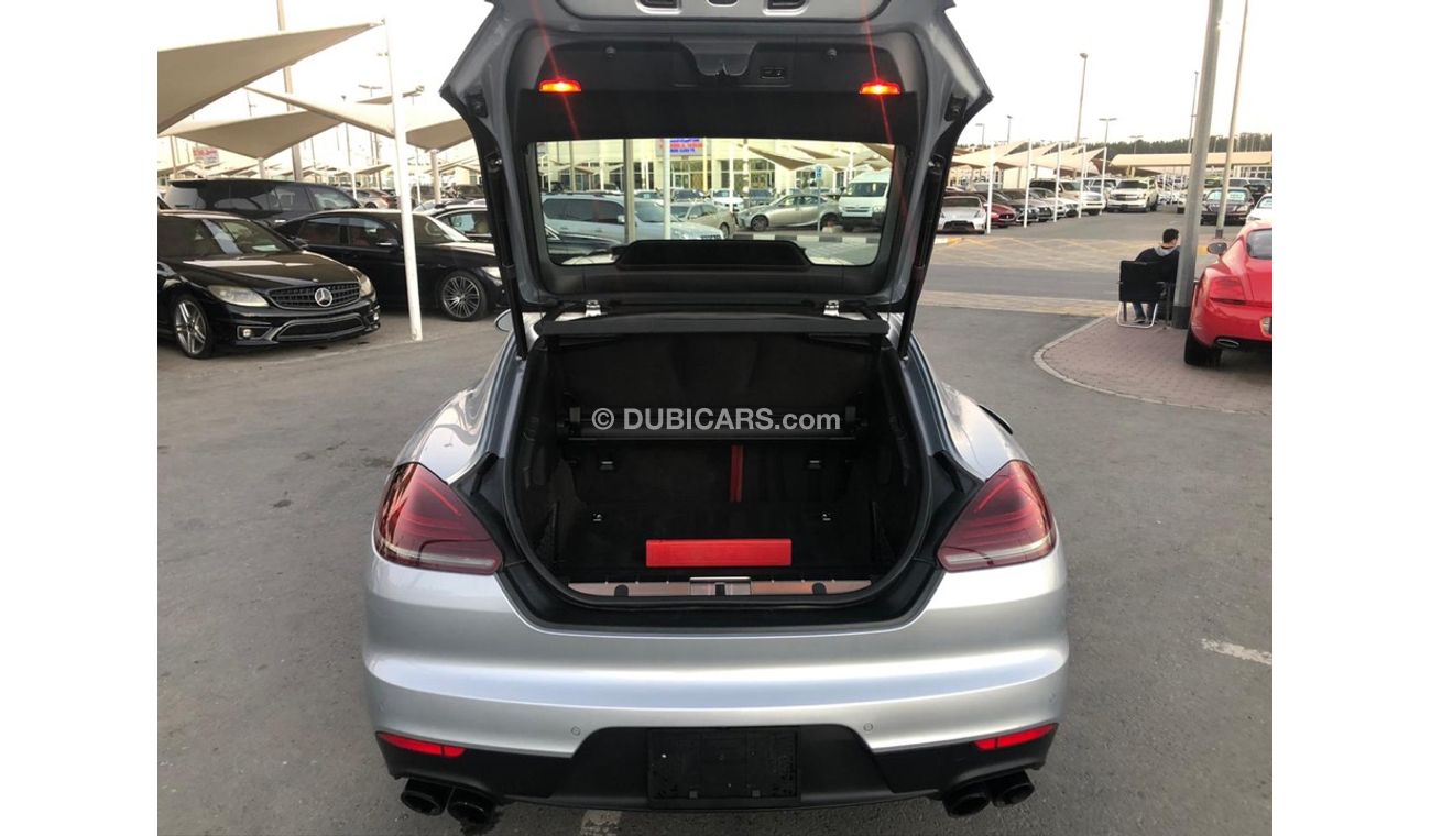 بورش باناميرا موديل 2014 خليجي فل مواصفات كراسي جلد ومثبت سرعه وتحكم كهربي كامل ونظام صوت ممتاز وكاميرا خلفيه ومثب