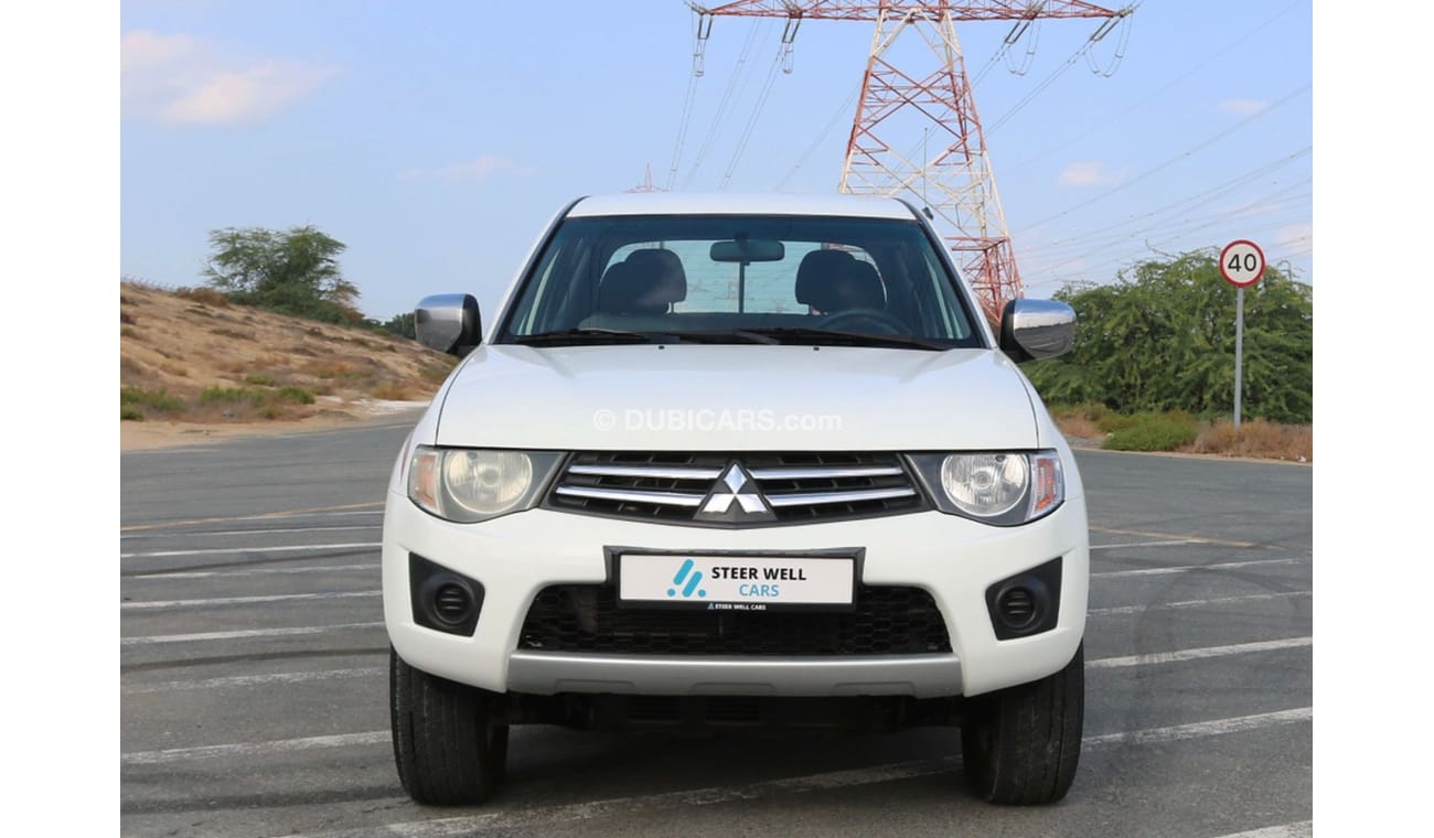 Mitsubishi L200 2015 | DIESEL 4X4 DOUBLE CABIN PICKUP WITH GCC SPECS AND EXCELLENT CONDITION