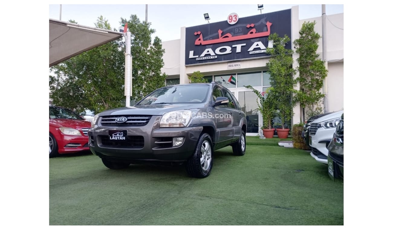 Kia Sportage 2008 model, Gulf agency, gray color, beige interior, in excellent condition, alloy wheels, rear sens