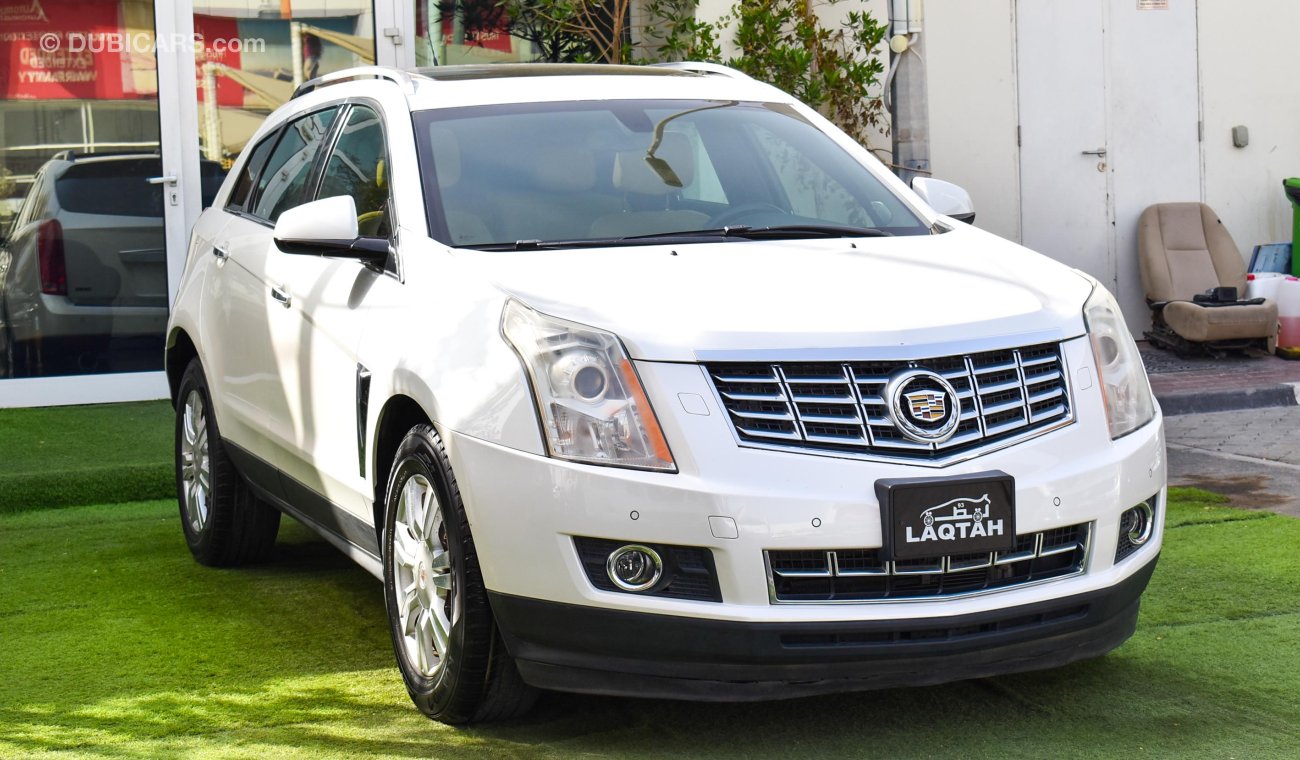 Cadillac SRX Gulf model 2015, full option, leather, panorama, cruise control, wheels, in excellent condition