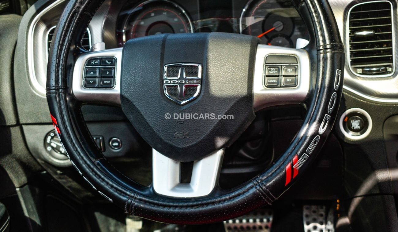 Dodge Charger Import - one number - manhole - leather - rear spoiler - cruise control - alloys - sensors in an abs