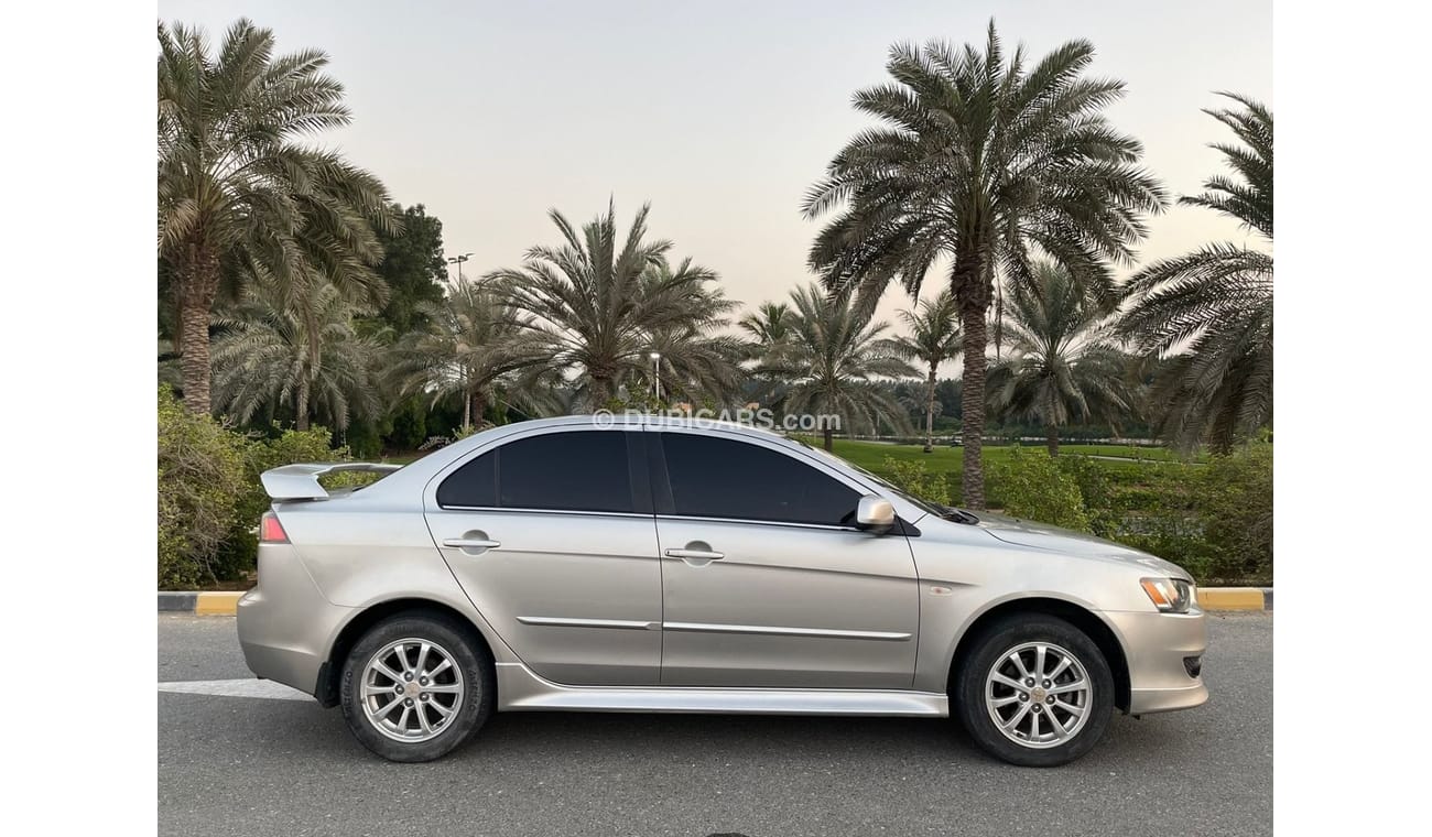 Mitsubishi Lancer MITSUBISHI LANCER 2,0 - GLS- mobile 2014 Excellent Conditio  Very celen car Full automatic Free acci