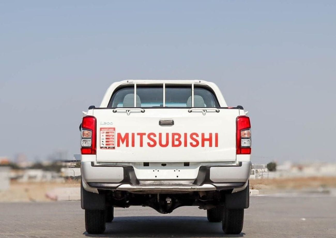 Mitsubishi L200 GL 2.4L (128 HP) Double Cab Utility Mitsubishi L200 2.4 L 4WD 2022 GCC accident-free in excellent co