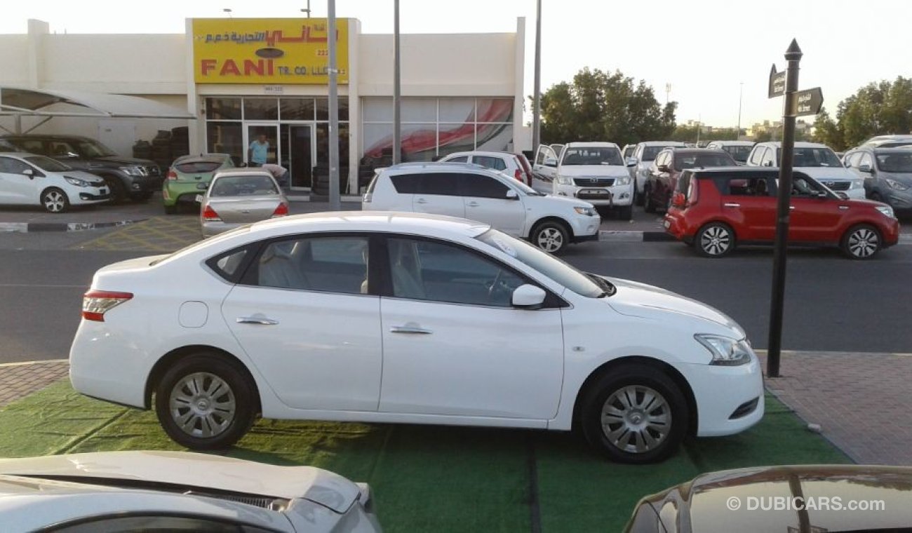 Nissan Sentra 2015 white 1.8 Gcc Excellent Condition without Accidents