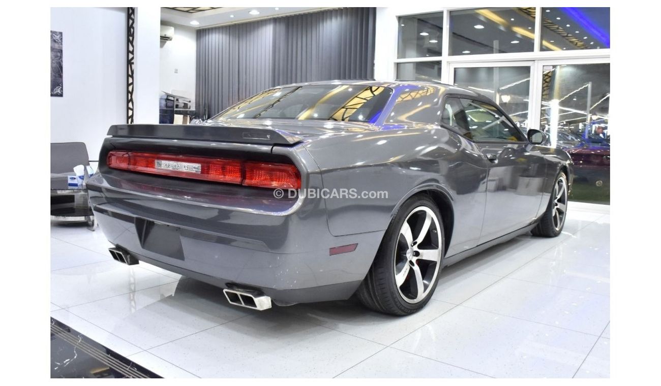Dodge Challenger SRT8 EXCELLENT DEAL for our Dodge Challenger SRT 392HEMI ( 2012 Model ) in Grey Color GCC Specs