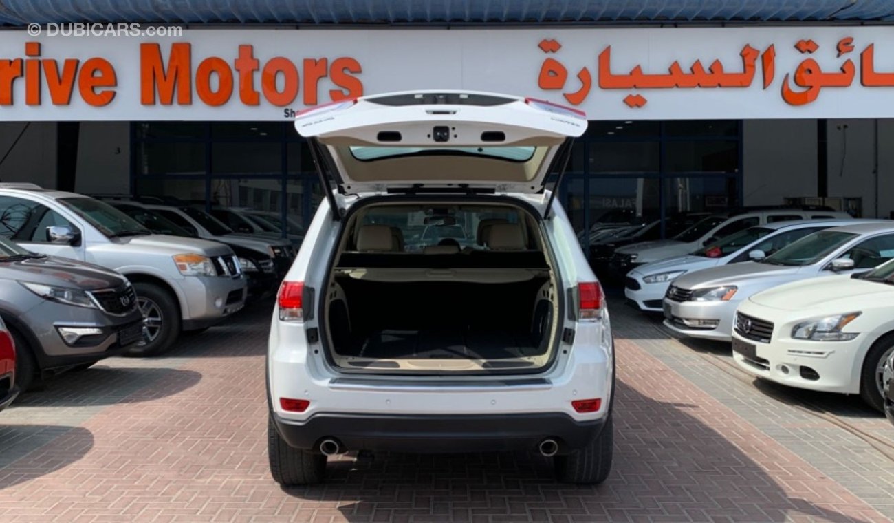 جيب جراند شيروكي JEEP CHEROKEE LIMITED 5.7 V8 JUST ARRIVED!! NEW ARRIVAL ONLY 1490X60 MONTHLY UNLIMITED KM WARRANTY