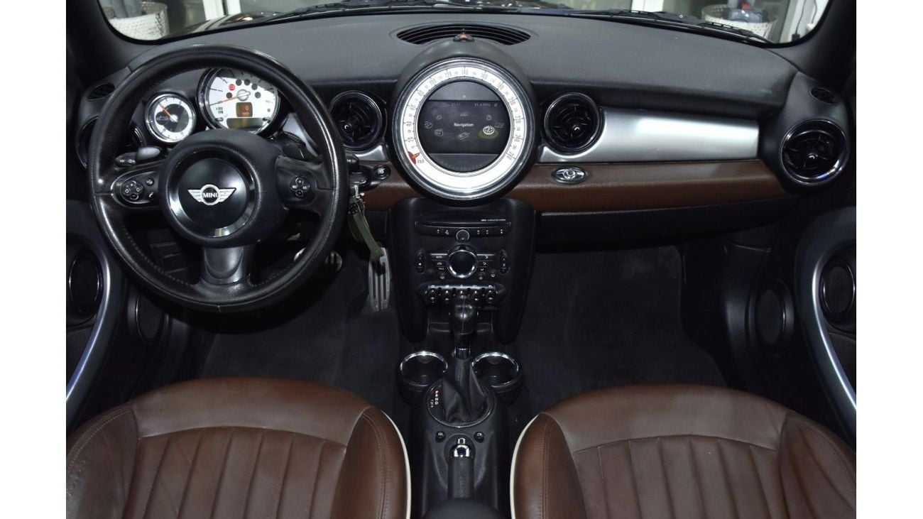 Mini Cooper S EXCELLENT DEAL for our Mini Cooper S Convertible ( 2011 Model ) in Brown Color GCC Specs