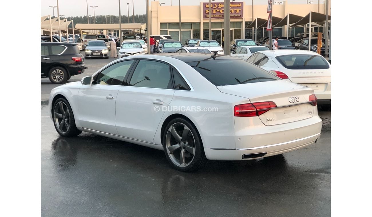 أودي A8 موديل 2015 خليجي فل مواصفات بانوراما ومثبت سرعه وتحكم كهربي كامل و5كاميرات وستاير وشاشات وطاولات خلف