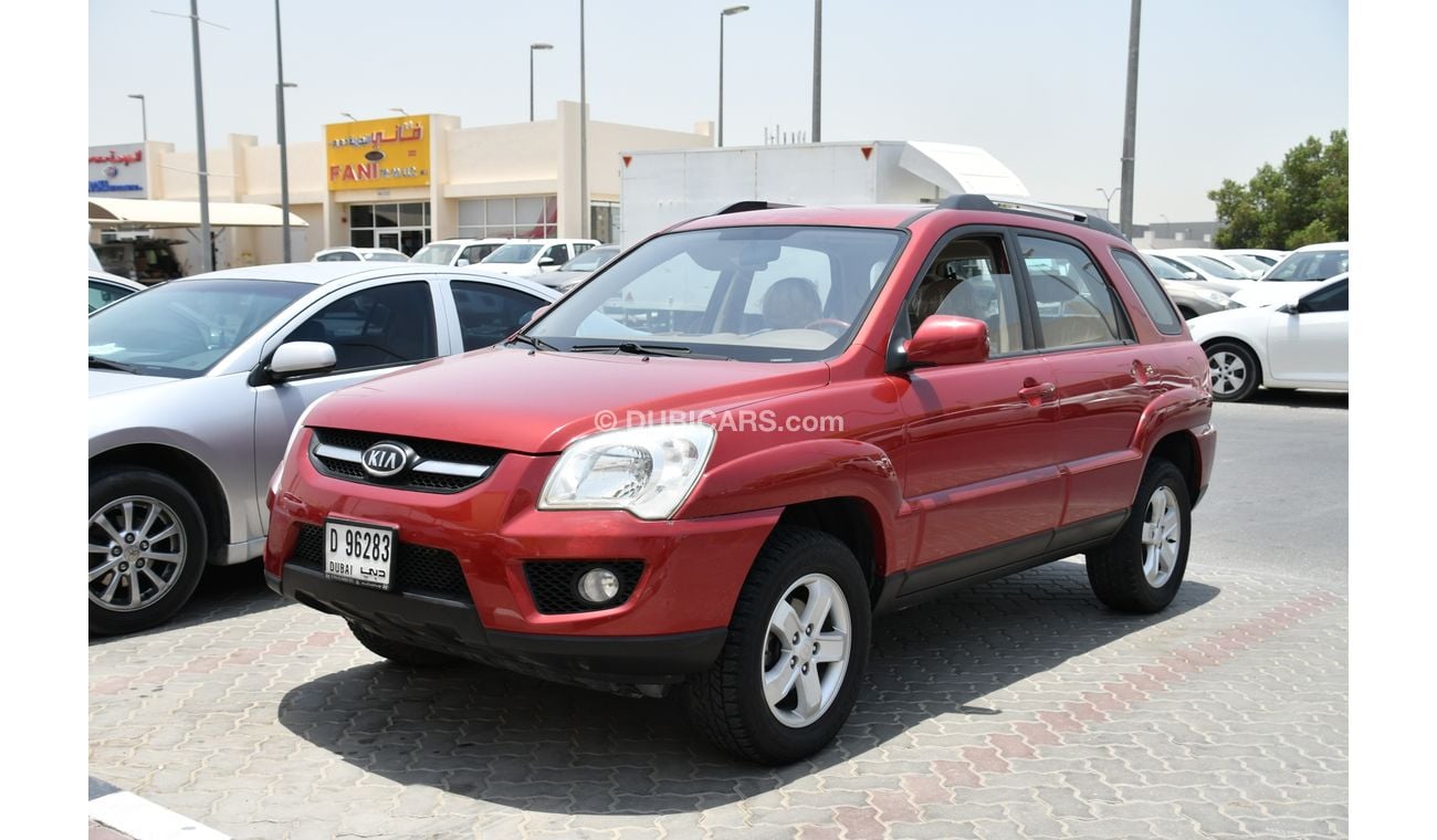 كيا سبورتيج احمر 2009 خليجى بحالة ممتازة بدون حوادث