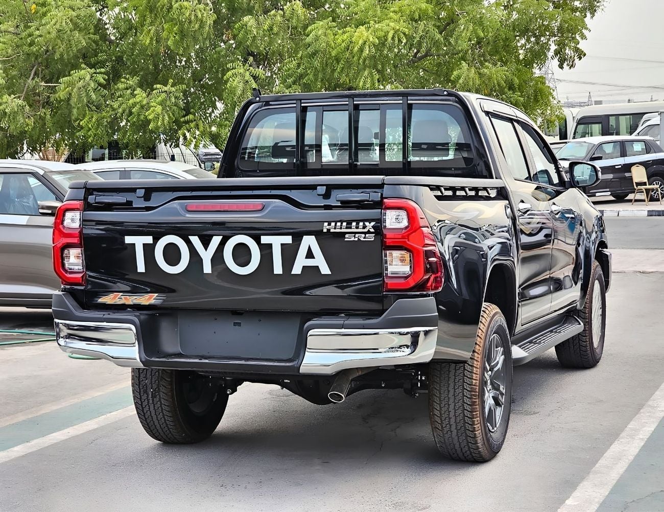 Toyota Hilux TOYOTA HILUX SR5 WIDE BODY DOUBLE CABIN || 2.7L PETROL A/T 4WD | BSM, WINOW VISOR, FOG LIGHTS, WOOD
