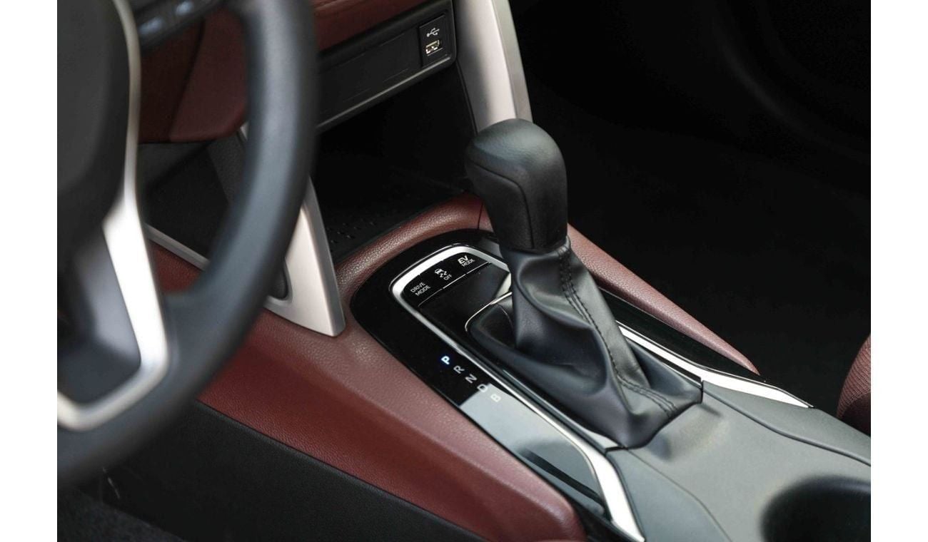 تويوتا كورولا كروس 2024 TOYOTA COROLLA CROSS 1.8 Hybrid MID - PLATINUM WHITE PEARL inside RED | Export Only