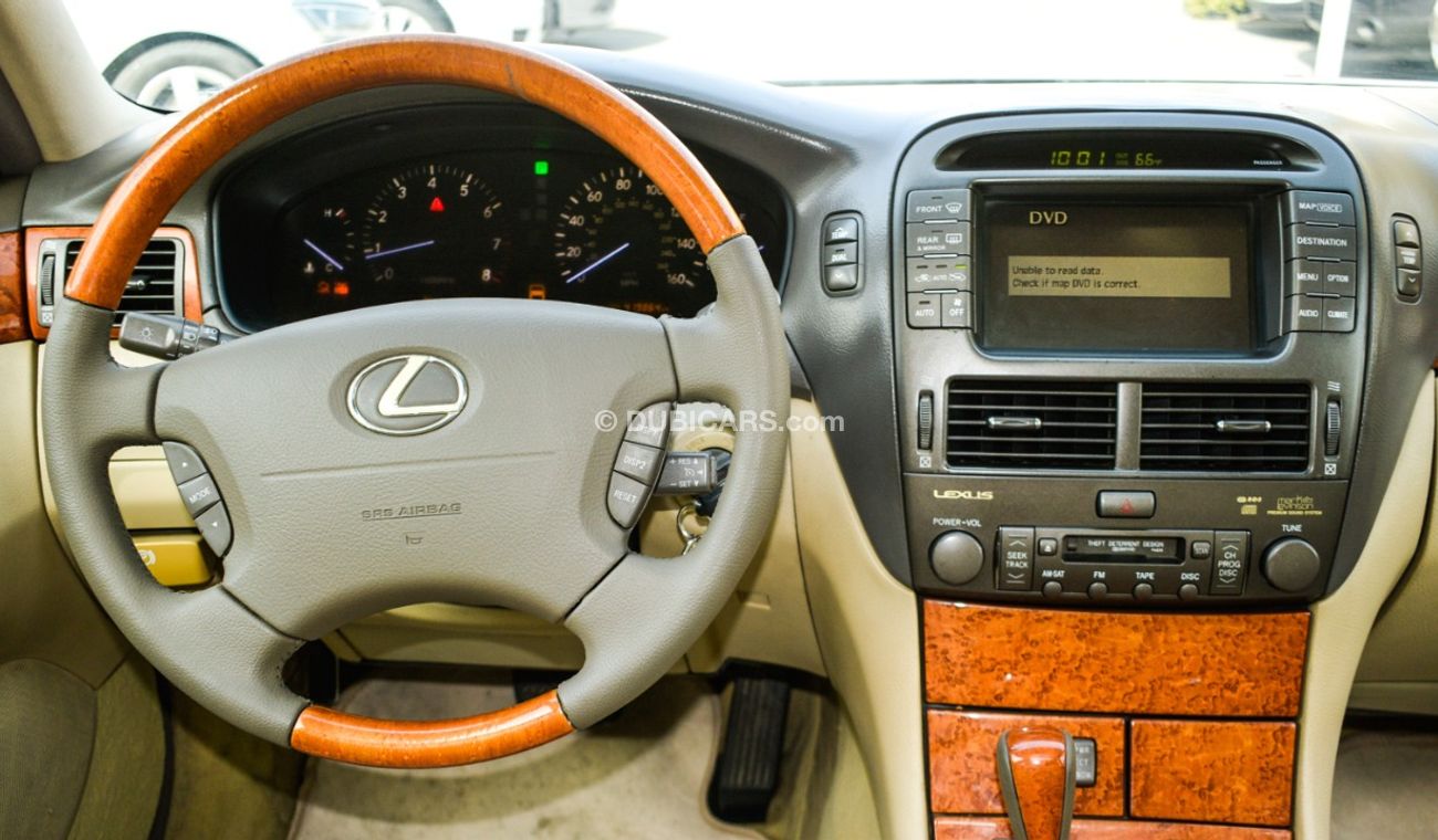Lexus LS430 Imported 1/2 Ultra 2006 model, white color, leather opening, wooden wheels, electric mirrors, electr