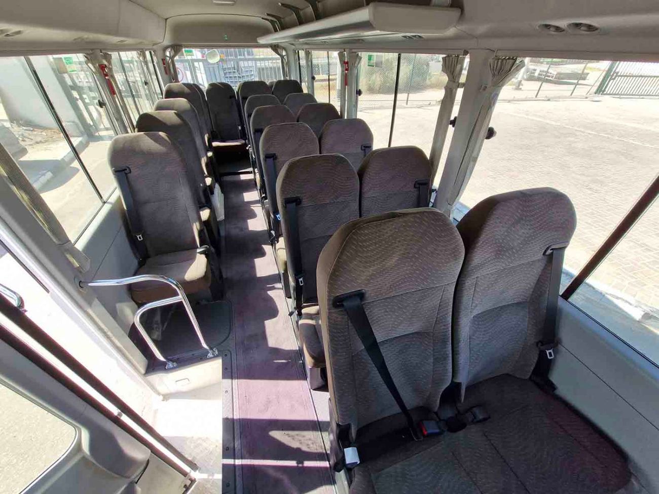 تويوتا كوستر ECTALM003 - 2025 Toyota Coaster – 2.8L Diesel Auto – 22 Seats, Cool Box