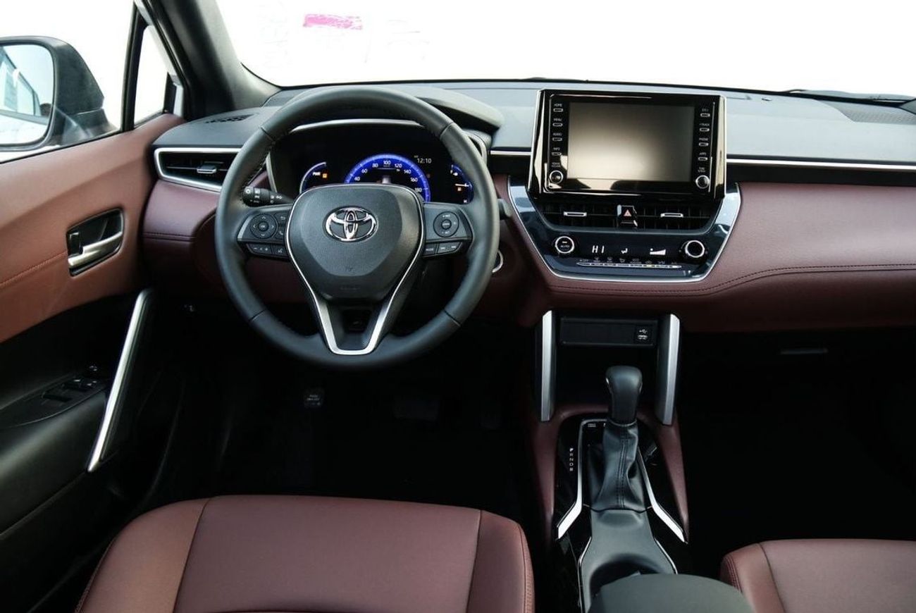 Toyota Corolla Cross Best offer for the new Corolla Cross Hybrid 2024 1.8L contact Now | Terra rosa color interior