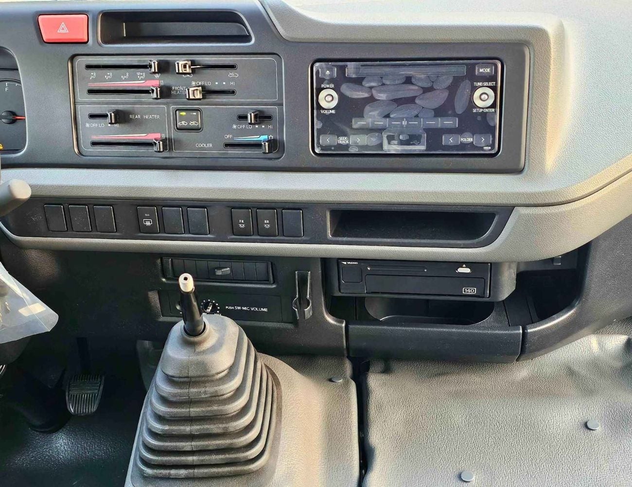 Toyota Coaster 2.7L PETROL M/T DUAL TONE || 23 SEATER | AUTO DOOR | HLF LUGGAGE RACK (CODE # COPB)