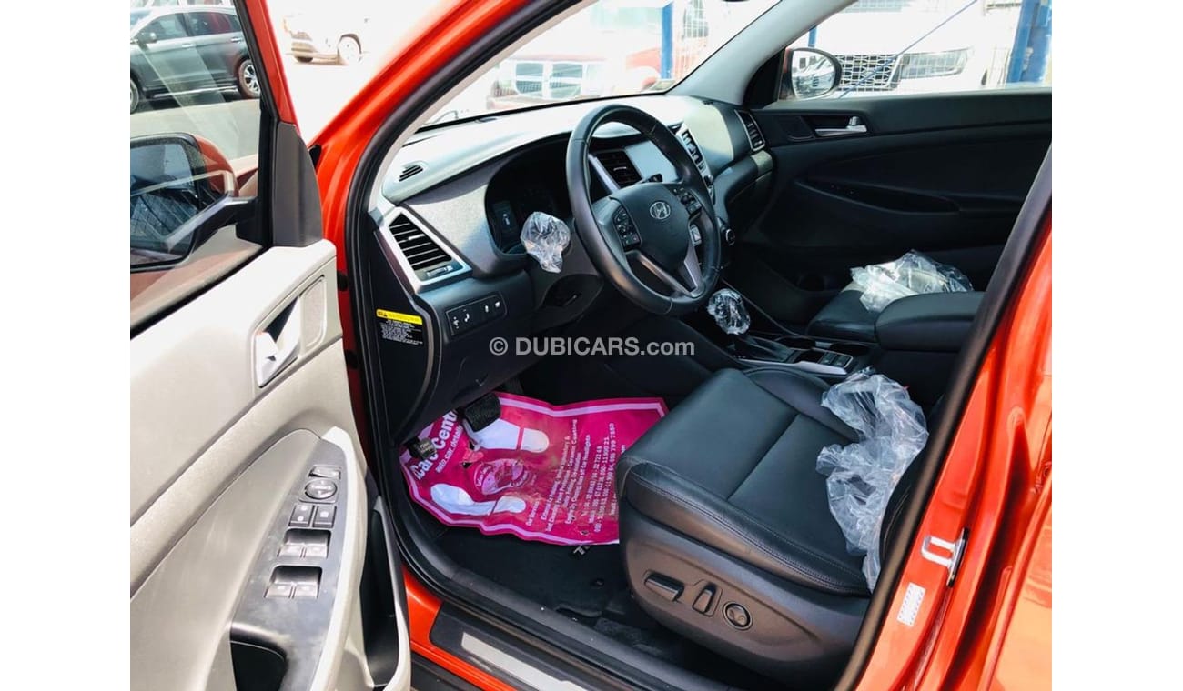 Hyundai Tucson LIMITED 1.6L TURBO-DVD-REAR CAMERA-2 POWER SEATS-19" ALLOY RIMS-LEATHER SEATS-NAVIGATION, LOT-603