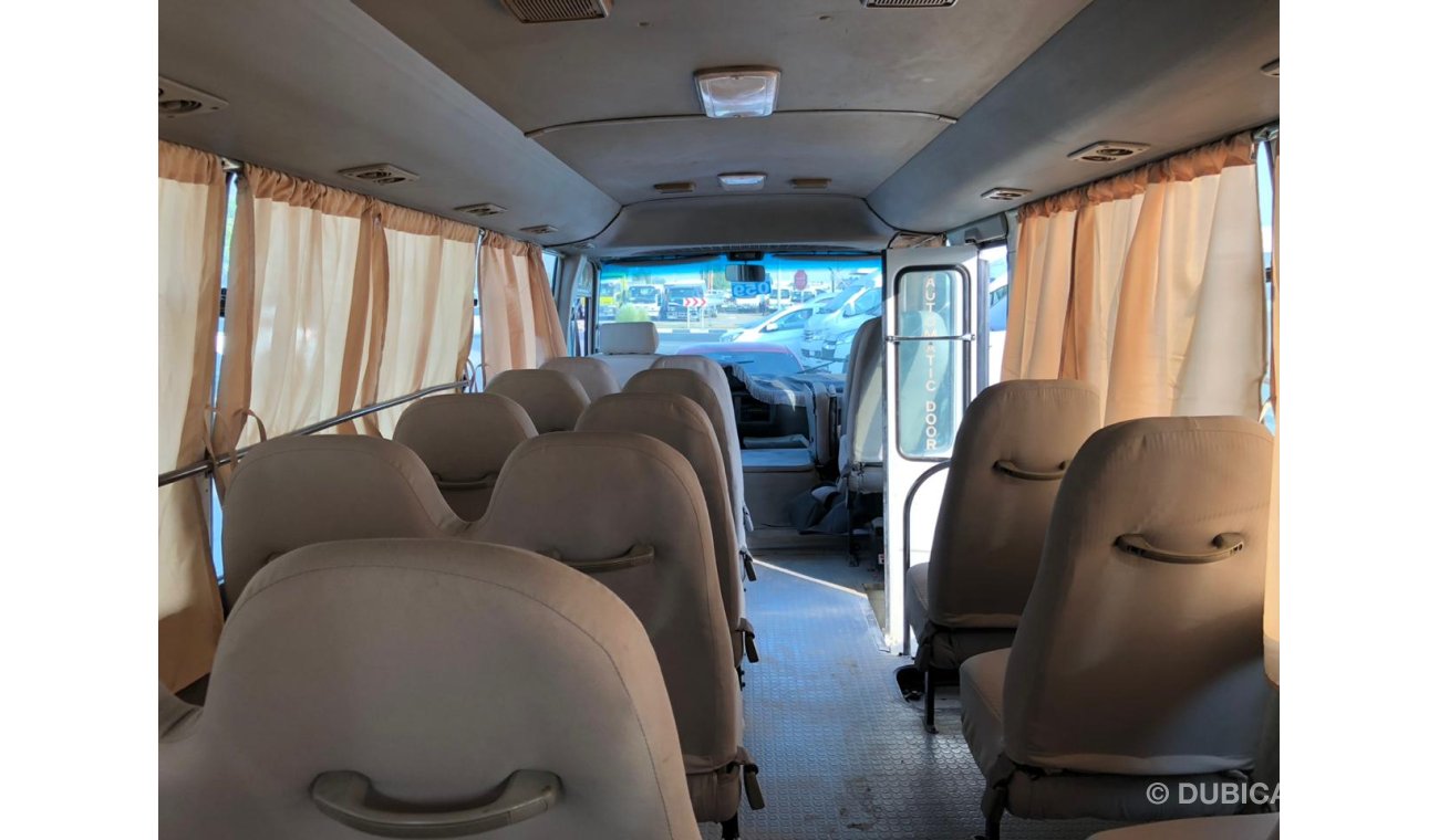 Toyota Coaster 4.2L Diesel, DVD + Rear Camera, Manual, MP3 Interface, DVD, CD Player, Tuner Radio, PARA ANGOLA