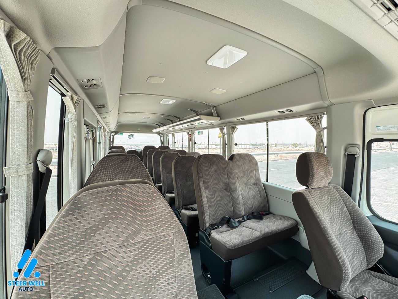 Toyota Coaster 23-Seater Bus 4.0L Diesel RWD GCC Specs Full Option White