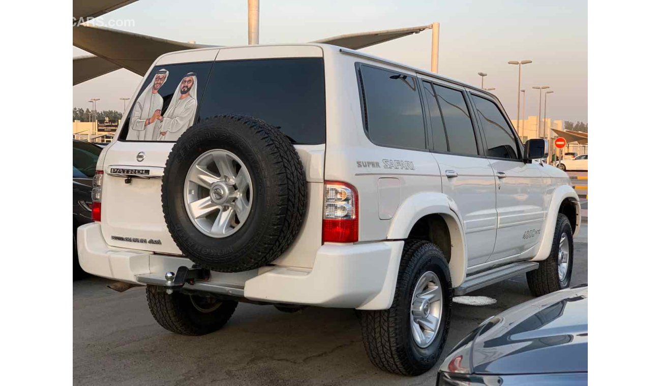 Nissan Patrol Super Safari نيسان فتك 1998 سوبر سفاري فول فتحة دفلوك ثلاجة مكيفين شاشة كاميرا دفدي نفكيشن محول 2004