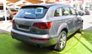 Audi Q7 2009 GCC model, silver color, saffron interior, leather panorama, cruise control, sensor wheels, in