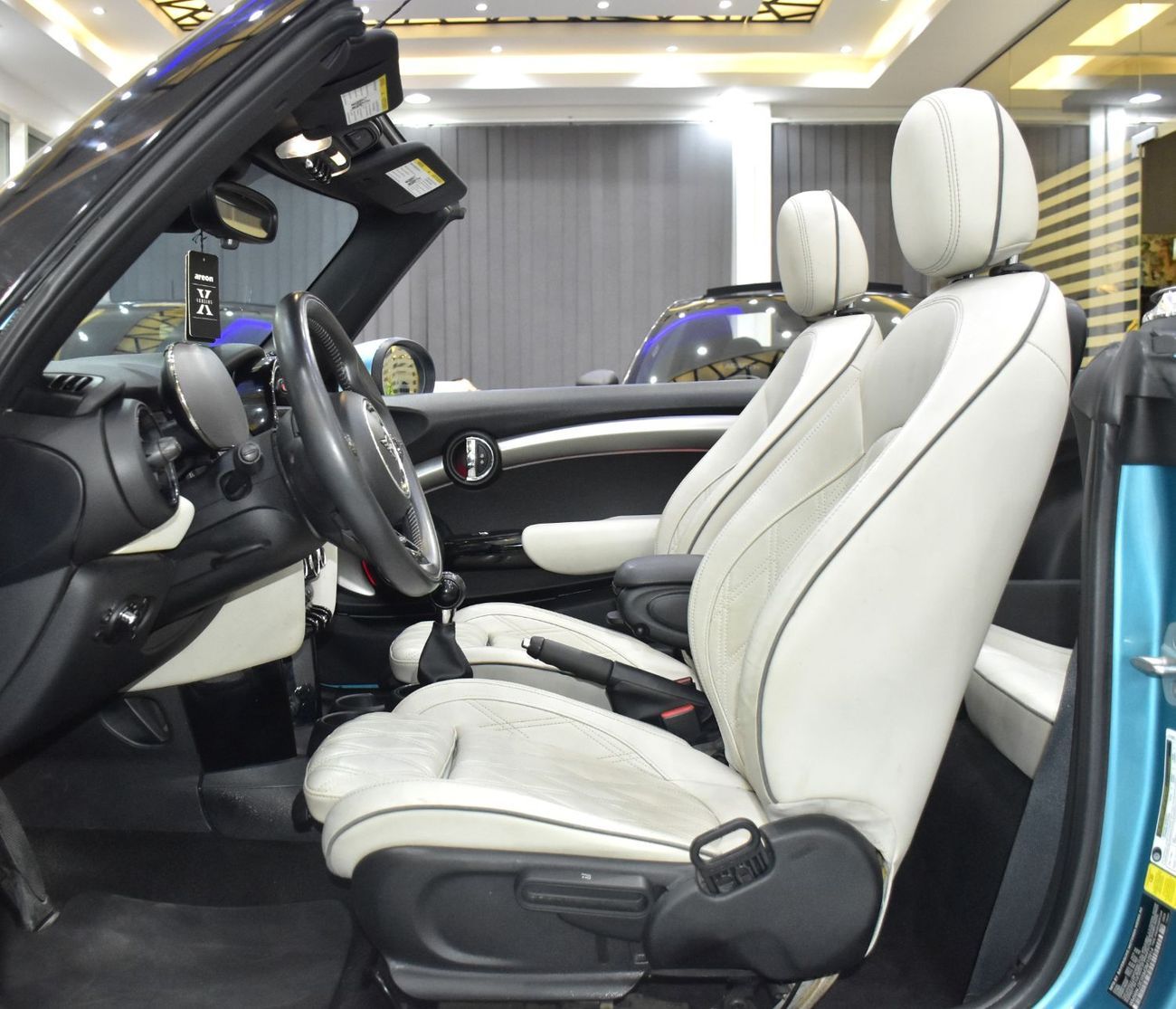 Mini Cooper Cabrio EXCELLENT DEAL for our Mini Cooper Cabrio ( 2021 Model ) in Blue Color American Specs