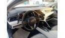 Toyota Camry LE 2022  White inside beige 2.5L petrol 4 Cylinder