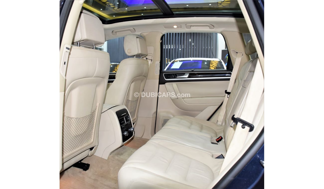 Volkswagen Touareg SEL EXCELLENT DEAL for our Volkswagen Touareg ( 2015 Model! ) in Blue Color! GCC Specs