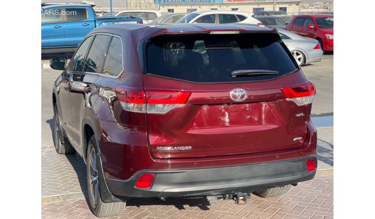 تويوتا كلوجير Toyota Kluger Petrol engine model FEB/2014 maroon color 7 seater  with push start and leather seats