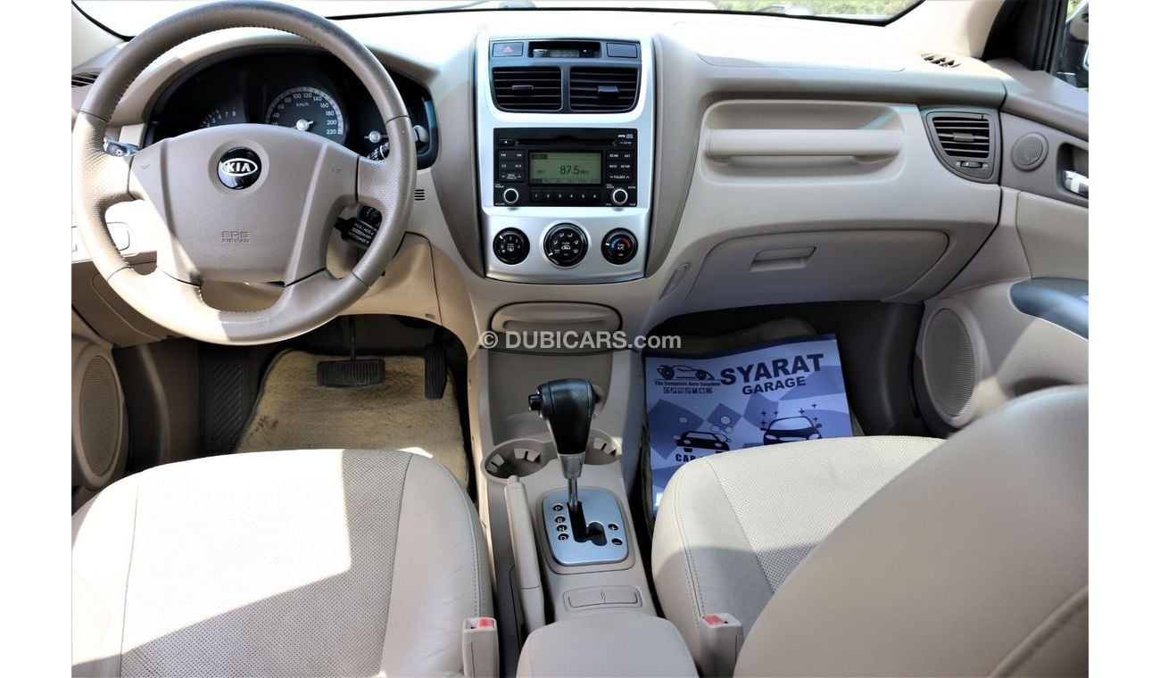 كيا سبورتيج كيا سبورتاج 2009 خليجي فل اوبشن جلد و فتحه فورويل 2700 سي سي