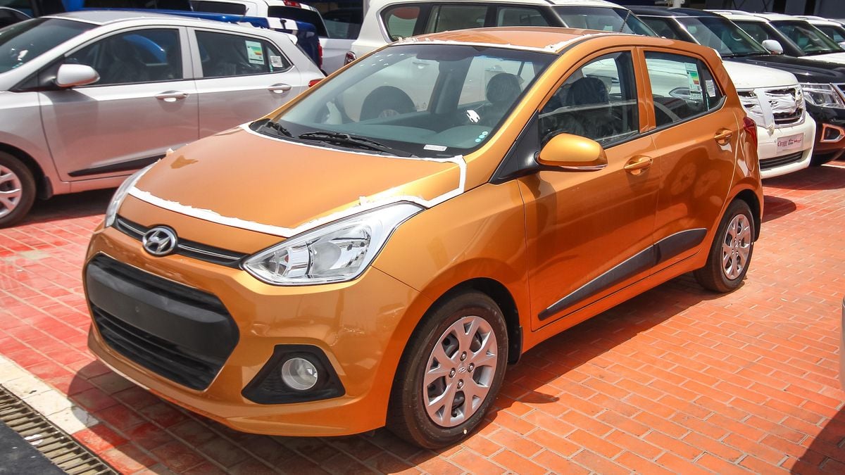 Hyundai i10 Grand for sale AED 29,500. Orange, 2017