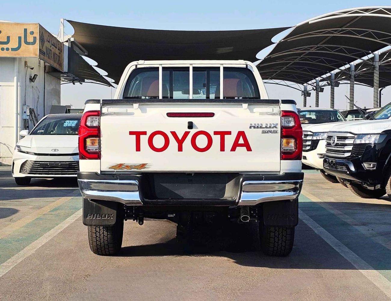 تويوتا هيلوكس SR5 FULL OPTION / M/T / 2.7L V4 PETROL /  DVD REAR CAMERA / 4WD (CODE # SR5)