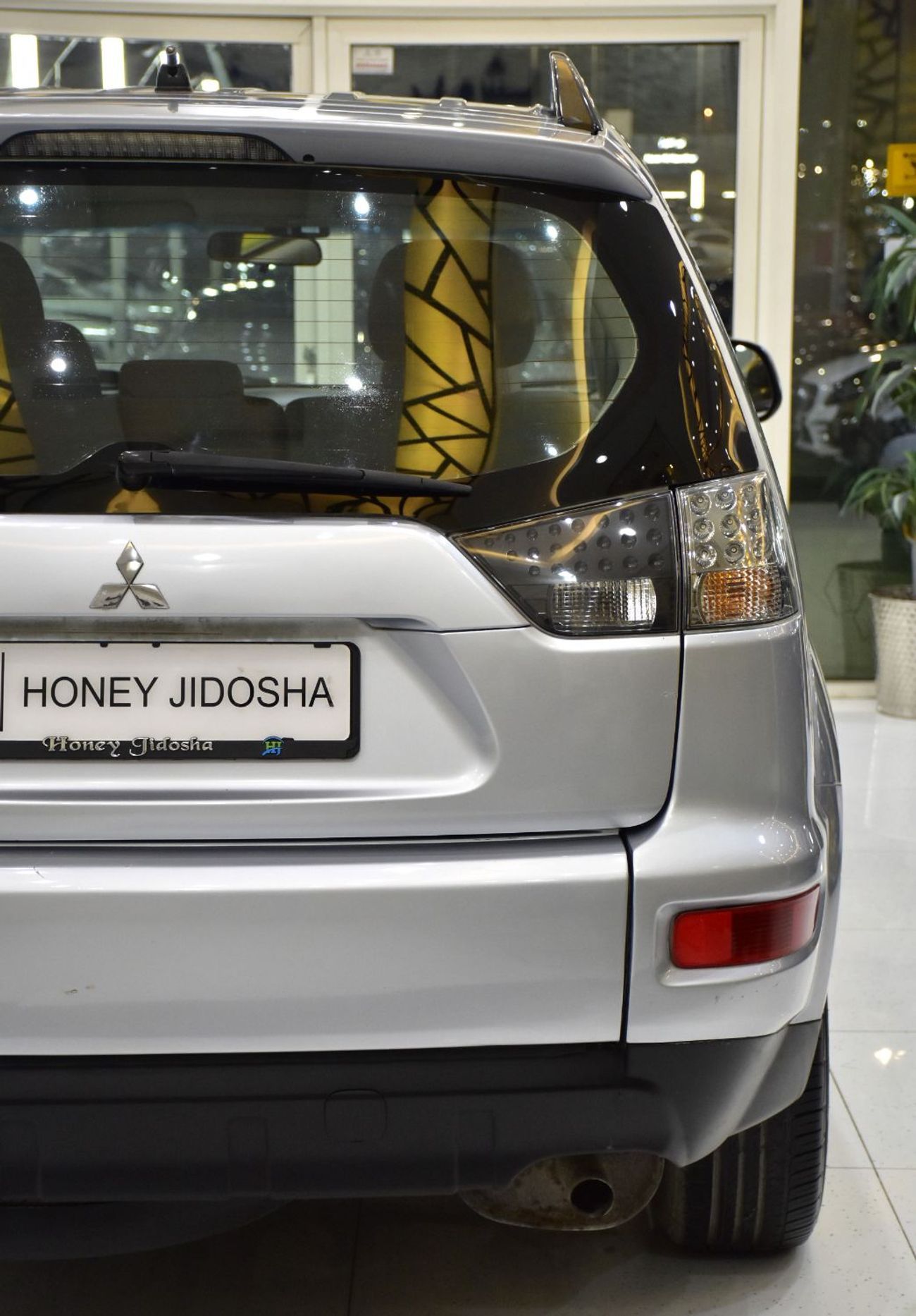 Mitsubishi Outlander EXCELLENT DEAL for our Mitsubishi Outlander 4WD ( 2012 Model ) in Silver Color GCC Specs