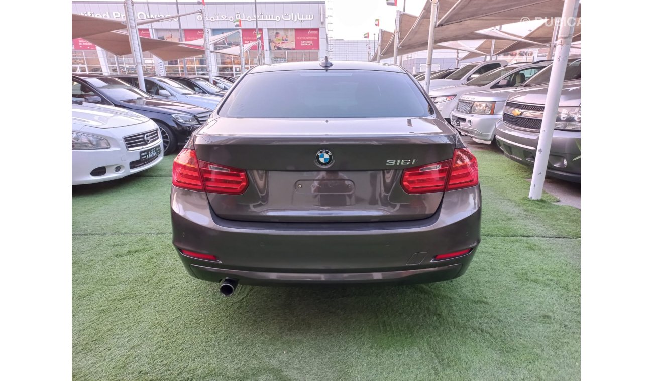 BMW 316i Model 2013 Gulf Brown BM316i color Cruise control, wheels control in excellent conditiona