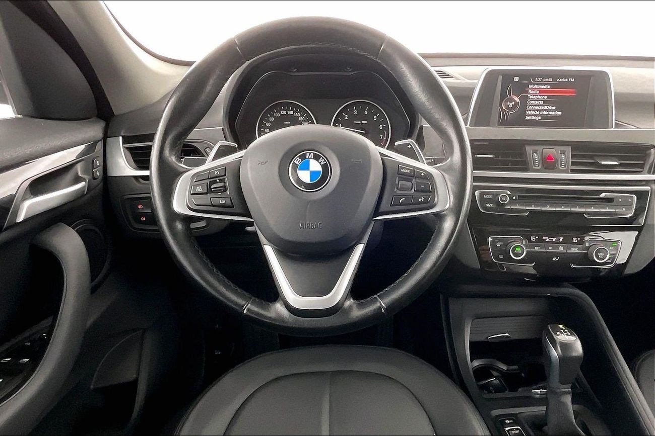 BMW X1 sDrive 20i Exclusive | National Day Celebration | Guaranteed Warranty | 0 Down Payment