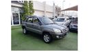 Kia Sportage 2008 model, Gulf agency, gray color, beige interior, in excellent condition, alloy wheels, rear sens