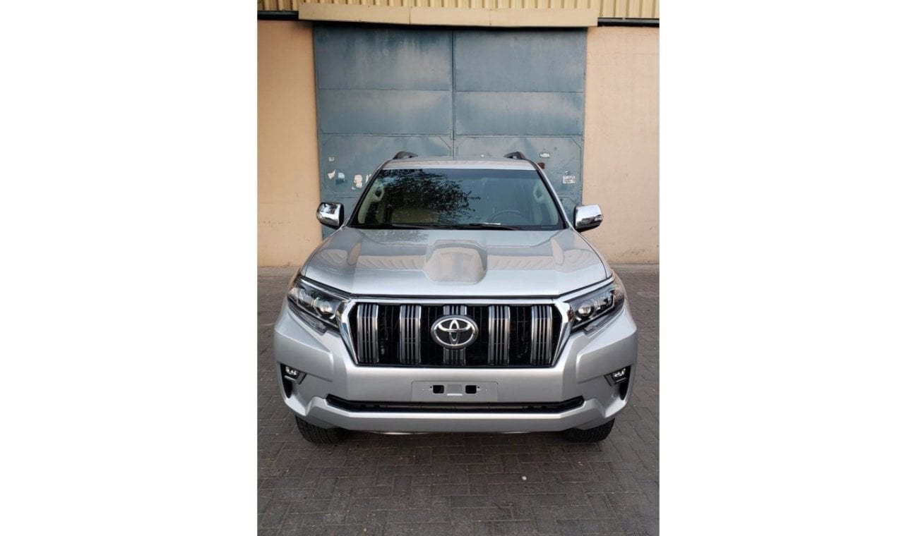 Toyota Prado Full option leather seats clean car Face change. Left hand drive