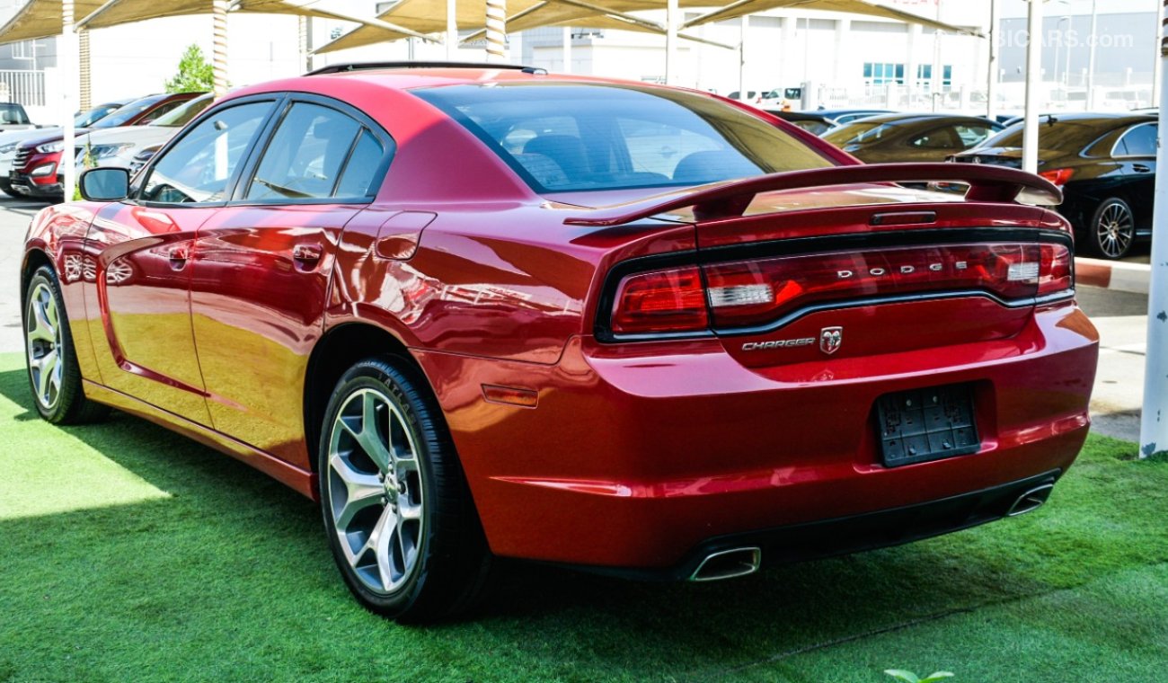 Dodge Charger Import - number one - manhole - leather - rear wing - cruise control - alloy wheels - sensors in exc