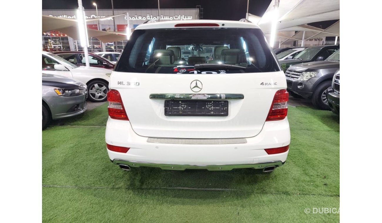 مرسيدس بنز ML 350 خليجي موديل 2011 لون ابيض داخل بيج رقم واحد فتحه جلد رنجات حساسات شاشه كاميرا بحاله ممتازه