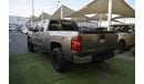 Chevrolet Silverado Pickup model 2009 imported silver color, equipped with two sides, half tyote wheels, sensors cruise