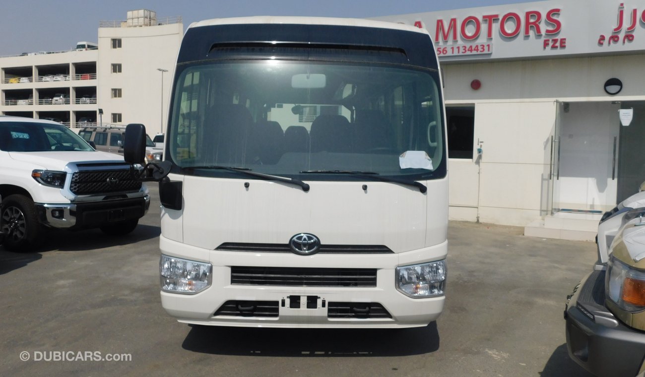 Toyota Coaster 4.2L M/T Diesel 23 passengers - Auto folding door