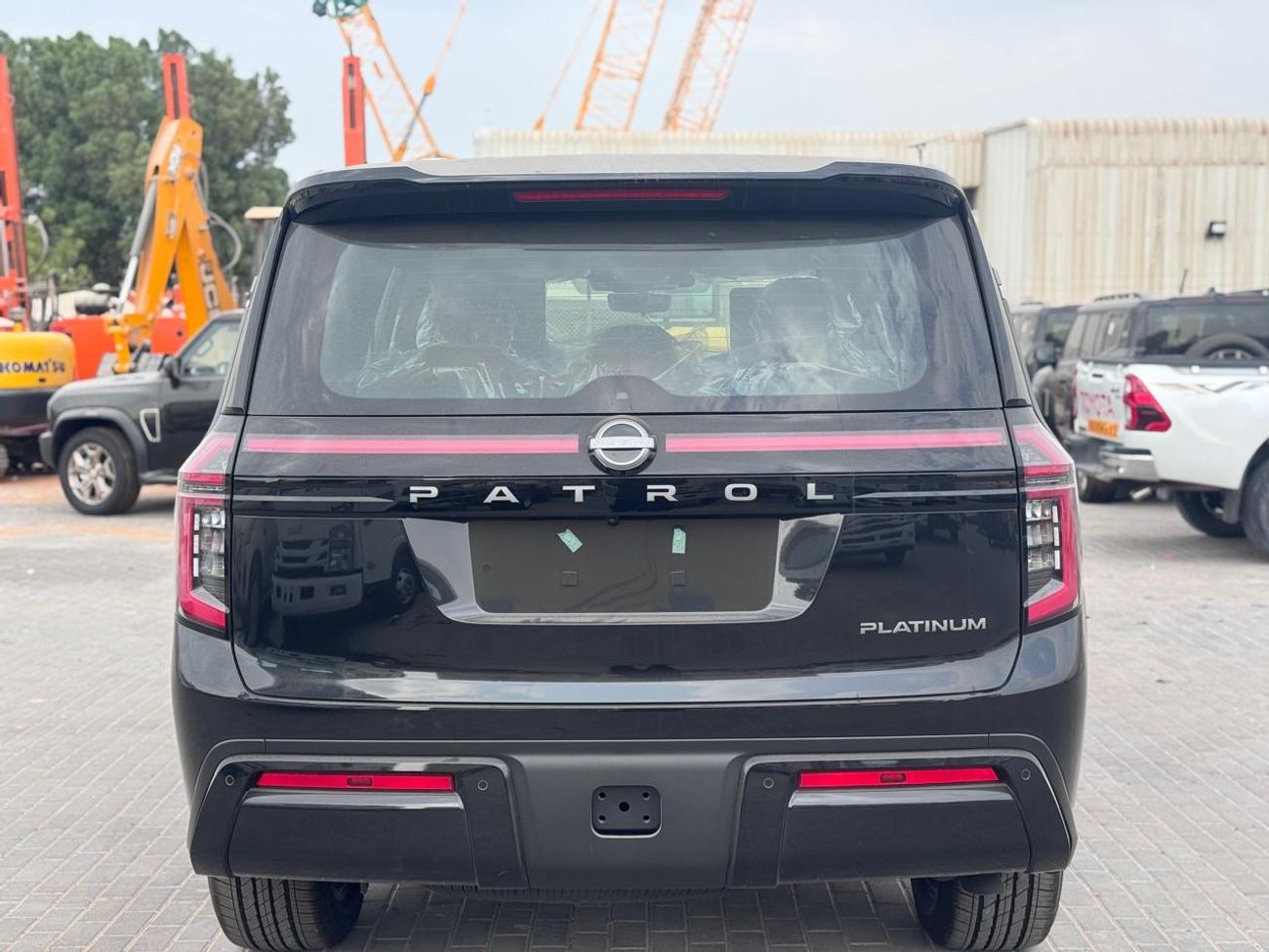 Nissan Patrol LE PLATINUM CITY 3.5L_ 2026_ (BLACK _BURGUNDY)